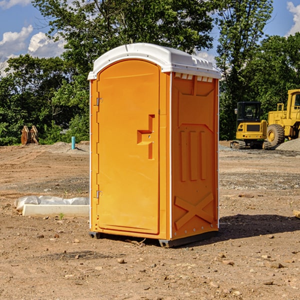 how often are the porta potties cleaned and serviced during a rental period in Door County